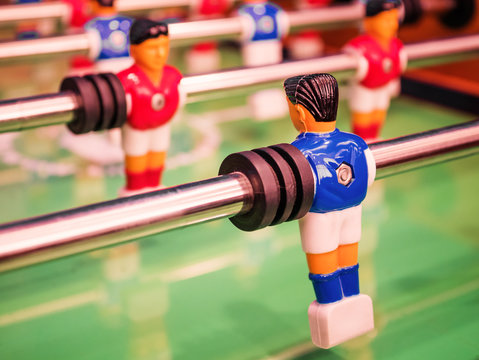 Closeup player of  football table game.