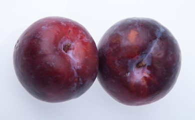 Plum. Ripe plum fruit on background
