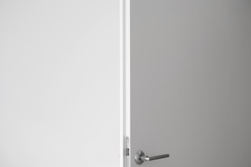 Open white door