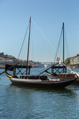 Fototapeta na wymiar Typical Rabelo Boats on the Bank of the River Douro - Porto, Portugal