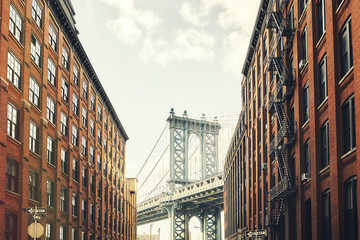 Fototapeta na wymiar Manhattan Bridge seen from Dumbo, retro toned picture, New York City, USA.