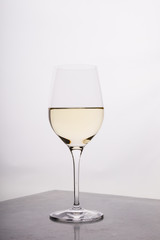 Glass of white wine on a bar counter
