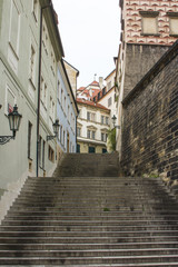 Stairs in a narrow street in the center of Prague. Czech Republic