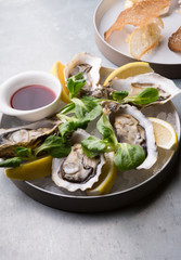 Oysters platter with lemon