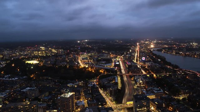 night time lapse of downtown boston in the direction of fenway park from the observation deck of skywalk in boston, massachusetts