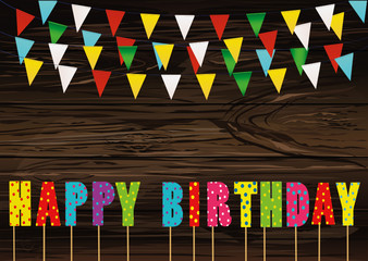 Colorful  letters happy birthday on stick. Rainbow garland 