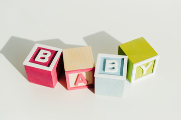 Word baby on letter wooden blocks