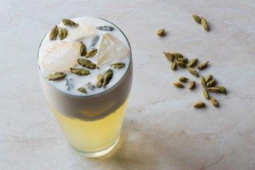 Cardamom Cocktail with Seeds, Cream and Ice.