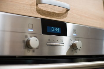 Metal electric kitchen oven control panel