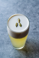 Cardamom Cocktail with Seeds, Cream and Ice.