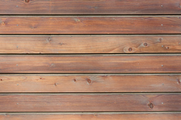 Fototapeta premium Hintergrund Holzwand aussen Bretterwand in Lärche mit Nut und Feder