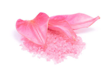 Fototapeta na wymiar Pink flower petals and salt for SPA