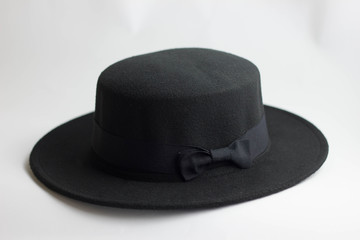 Black female hat on a white background