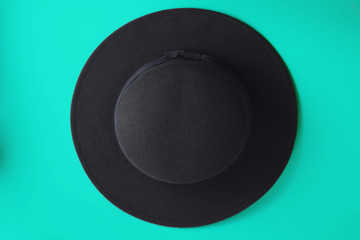 Black hat on a blue background