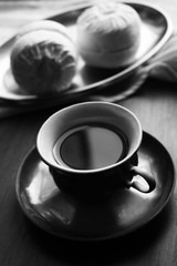 composition with cup of coffee and white marshmallows