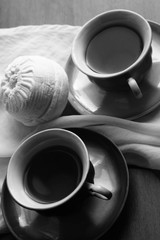 composition with cup of coffee and white marshmallows on the table