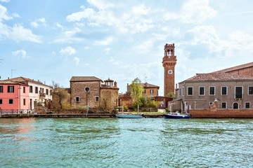 Fototapeta na wymiar Daylight view to Venetian Lagoon and parked boats