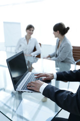 Fototapeta premium closeup of businessman typing on laptop.