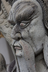 Fototapeta na wymiar Thailand Bangkok Buddhist temple Stone sculpture