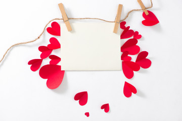 Love background. Greeting card with red paper hearts.
