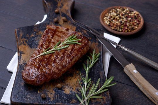 Closeup beef steak and rosemary