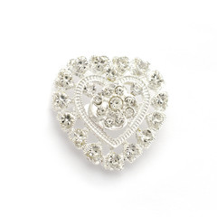 Brooch silver heart with diamonds isolated on white