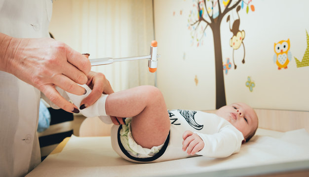 Neurologist Diagnosing Little Boy. Pediatric