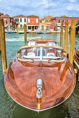 Fototapeta na wymiar Daylight view to parked classic yacht on pier
