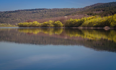 river landscape. Photo from the boat. A lot of sky. Blue sky with clouds. Greenish waves. Summer. the Dniester River