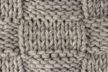 Knitting. Gray knit fabric texture background or knitted pattern background