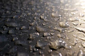 a close-up of frozen water droplets in a severe frost, a texture of icy, shapeless elements