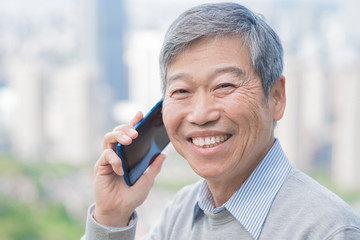 old man speak on phone