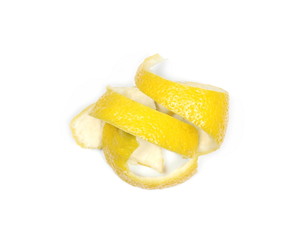 Yellow lemon peels isolated on white background, top view