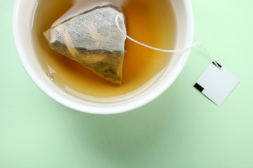 Mint tea bag in a cup