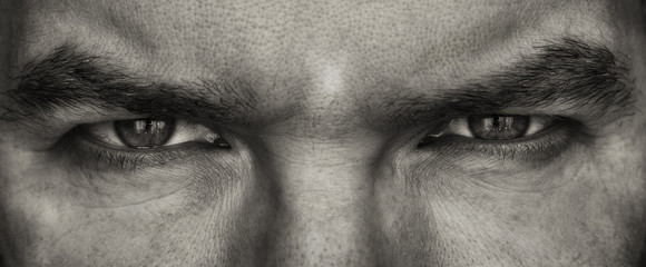 man's eyes - Powered by Adobe