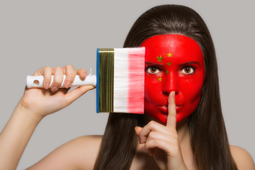 Female supporter in national colors of China