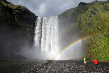 Waterfall Skogafoss and rainbow in Iceland