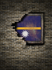 Old Nauru flag in brick wall