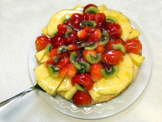 Fruitcake with strawberry pineapple and kiwi