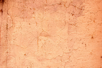 Wall fragment with scratches and cracks