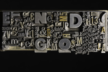 Metal Letterpress Types.
A background from many historical typography letters in black and white with white background.

