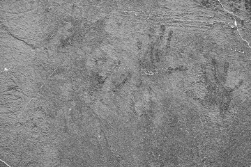 Wall fragment with scratches and cracks