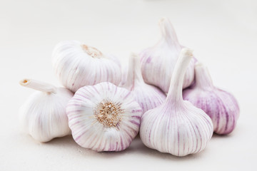 garlic bulbs on white background