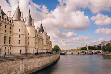 Fototapeta na wymiar a daytime view of the castle Conciergerie - former Royal Palace and prison. located in the West of the island of the city and today it is part of a large complex known as the Palace of justice. Paris