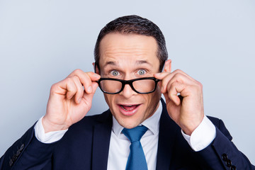 People emotion expressing person freelance entrepreneur happiness economist concept. Close up portrait of excited curious funky handsome clever intelligent freelancer isolated on gray background