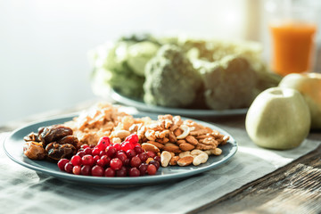 Take the best. Fresh natural different products being on the table waiting for being taking.