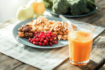 Choose your favorite. Different kinds of fresh products lying in the plate on the table.