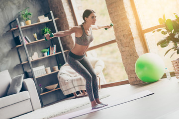 Low-angle photo of sportive strong active attractive purposeful ideal woman with excellent body...