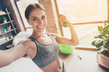 Close up portrait of delightful beautiful ideal slim sportive powerful muscular positive woman...