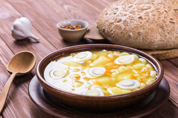 Soup with quail eggs